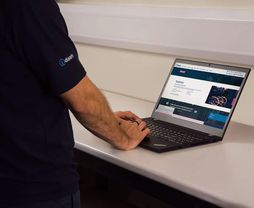 Trusted IT Partner idash stock photo working on a computer